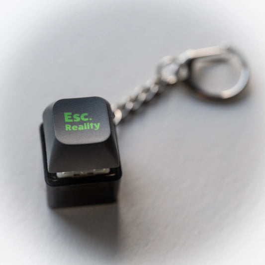 Escape Reality Clicky Keychain - pressable black keyboard-key fidget toy by PlayGay
