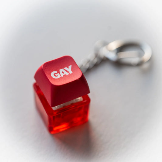 Gay Clicky Keychain - pressable red keyboard-key fidget toy by PlayGay