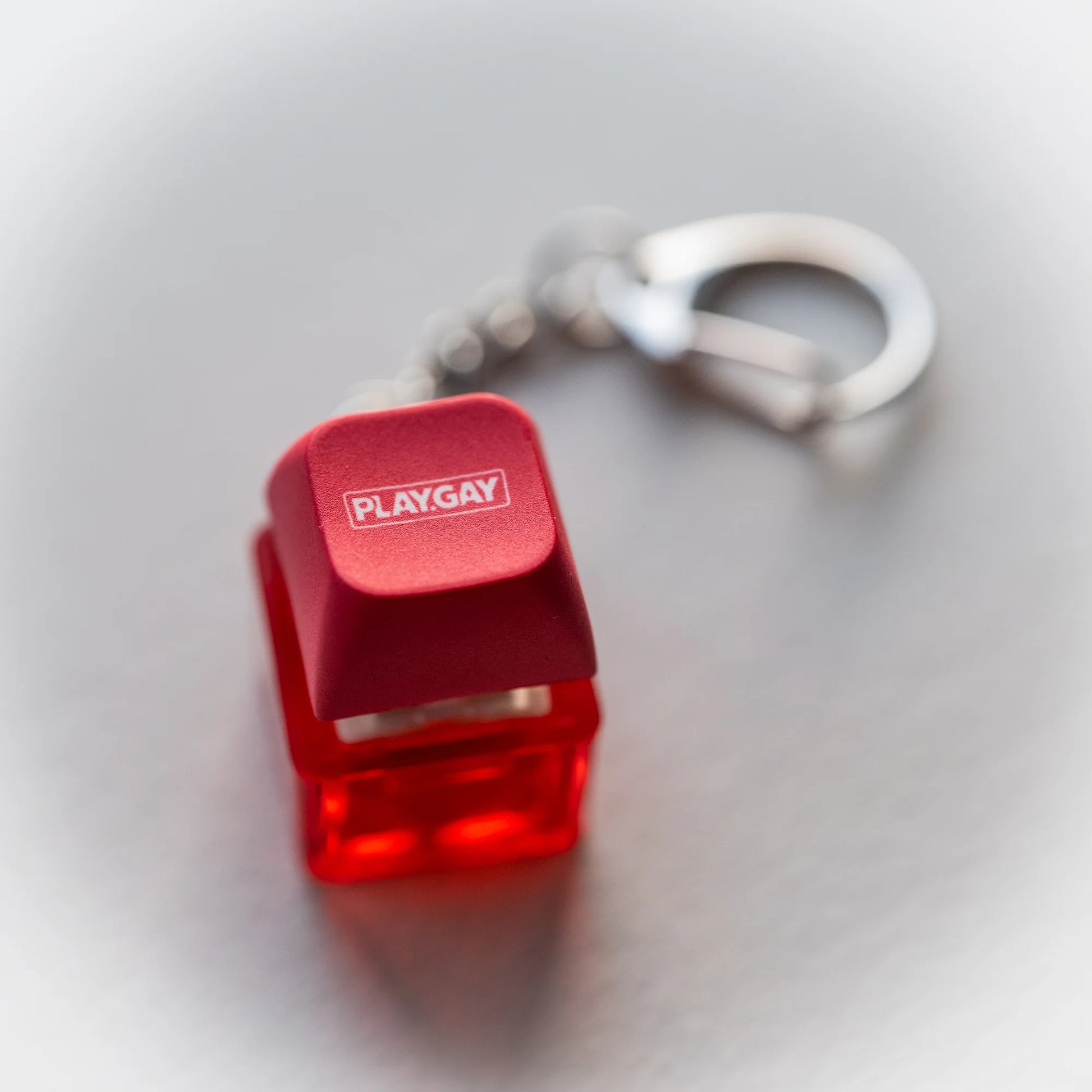 PLAY.GAY Clicky Keychain - pressable keyboard-key fidget toy by PlayGay