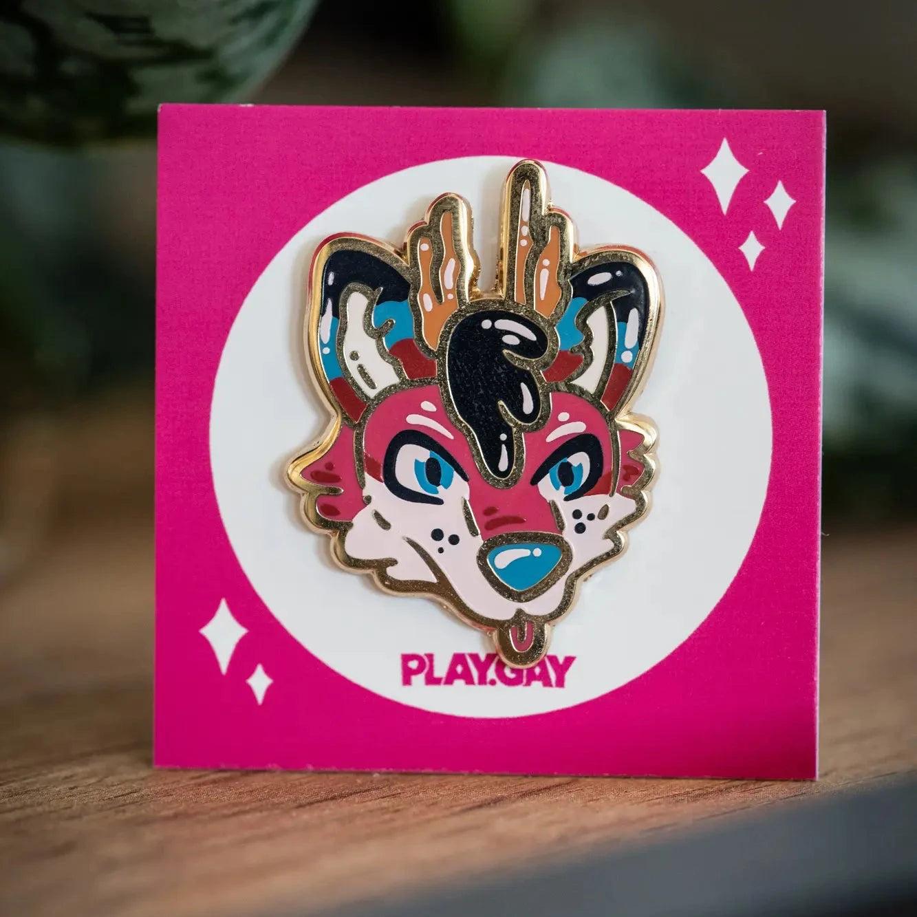 PlayGay x hiccadafox Fox Deer Enamel Pin - enamel pin with colourful fox deer face design on pink backing card