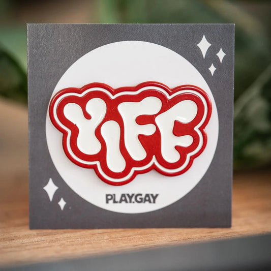 PlayGay Yiff Enamel Pin - bold red YIFF lettering in chrome hard enamel on grey backing card