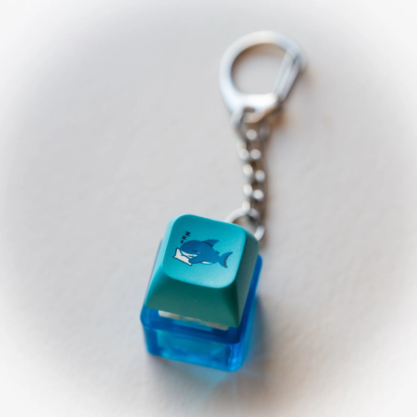 Sleepy Shark Clicky Keychain - pressable blue keyboard-key fidget toy by PlayGay