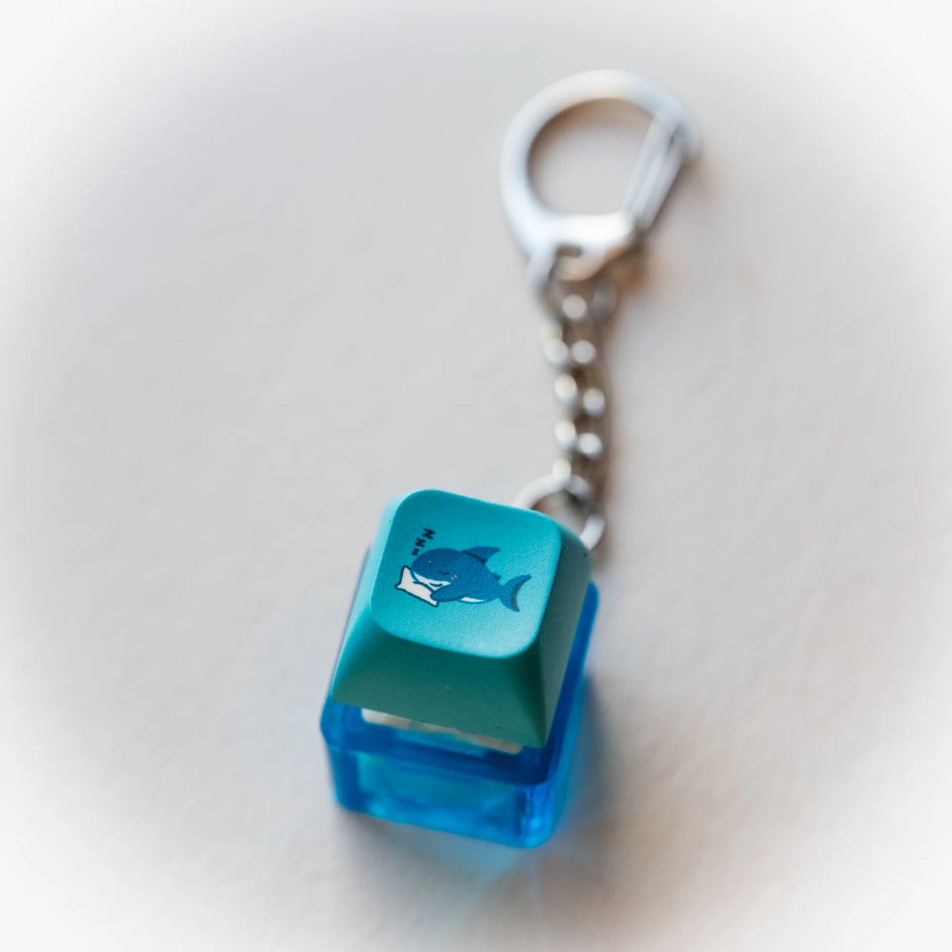 Sleepy Shark Clicky Keychain - pressable blue keyboard-key fidget toy by PlayGay