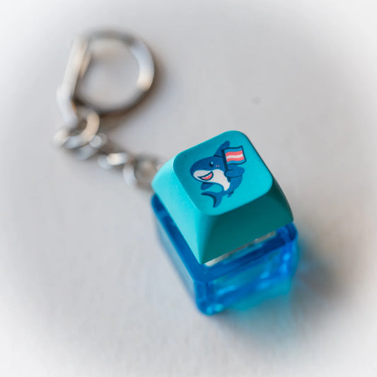 Trans Pride Shark Clicky Keychain - pressable keyboard-key fidget toy with trans flag shark by PlayGay